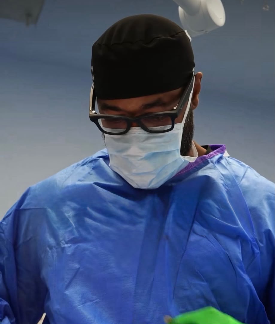Dr. Clifton preparing for surgery