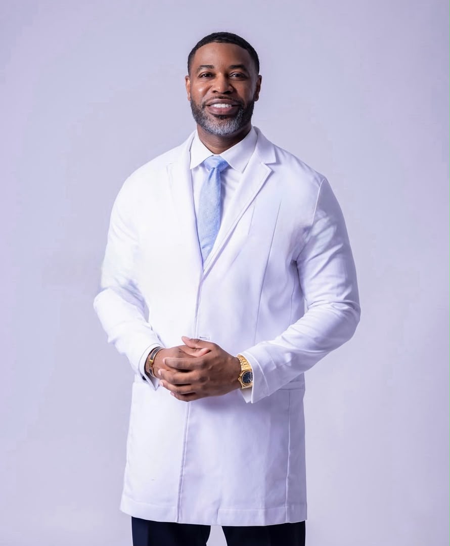 Dr. Clifton in a white coat